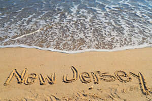 New Jersey written in sand outside Seaside Park summer rental